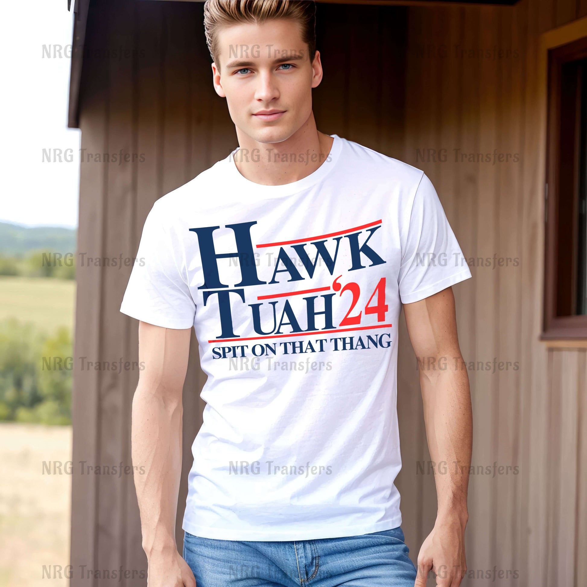 a young man standing in front of a barn