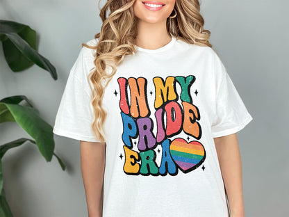 a woman wearing a white t - shirt that says, i love my pride