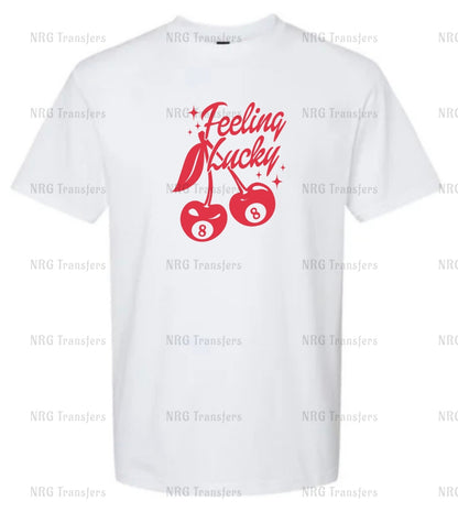 a white t - shirt with red lettering and two cherries