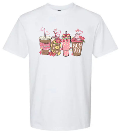 a white t - shirt with two cups of coffee on it