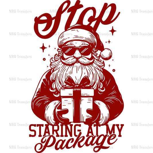 a santa claus holding a gift box with the words stop staring at my package