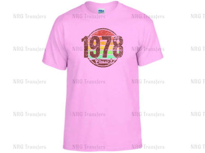 a pink t - shirt with the number seventy on it