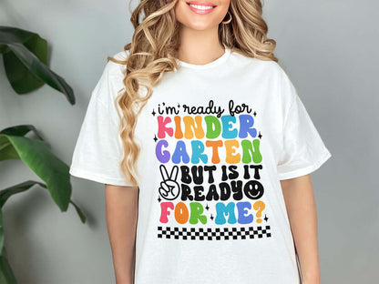 a woman wearing a t - shirt that says i'm ready for kinder