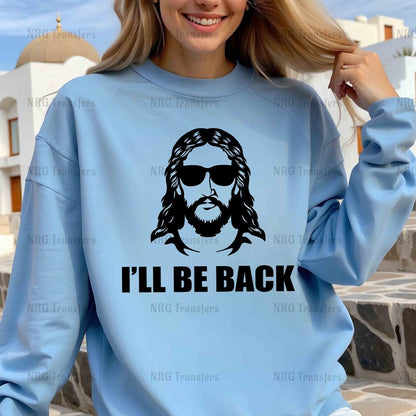 a woman wearing a sweatshirt that says i'll be back