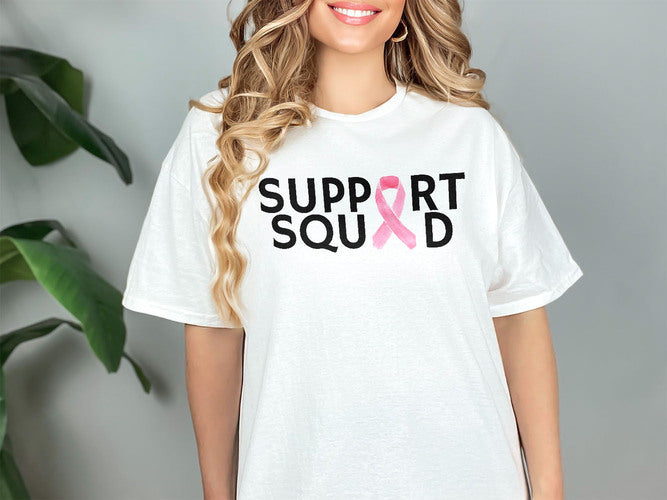 a woman wearing a t - shirt that says support squad