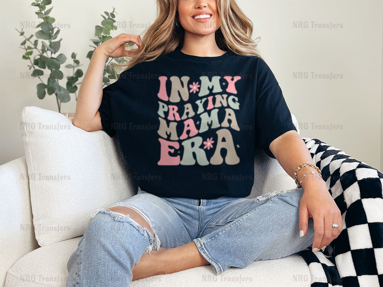 a woman sitting on top of a white couch