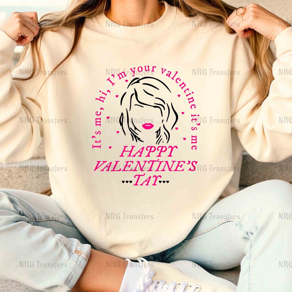 a woman wearing a sweatshirt that says happy valentine's day