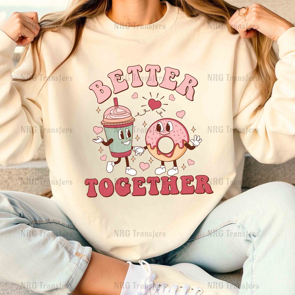 a woman wearing a sweatshirt with a donut and coffee on it