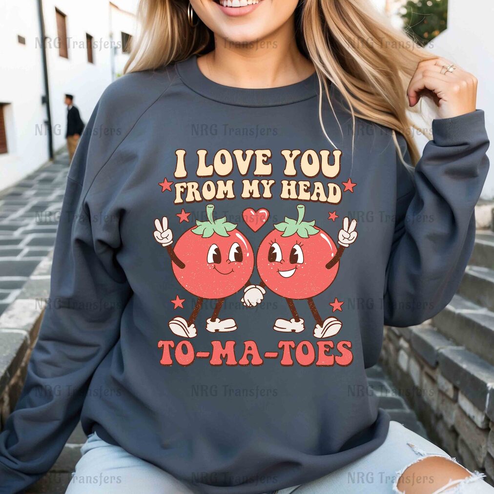 a woman wearing a sweatshirt that says i love you from my head to - ma