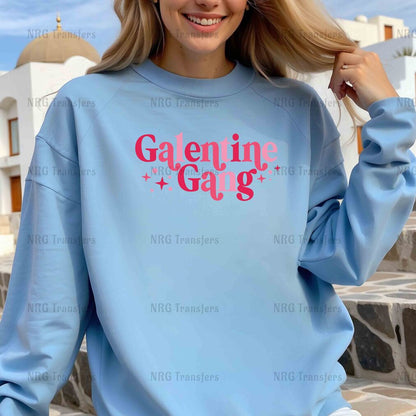 a blonde woman wearing a blue sweatshirt with the words'galine gal'on