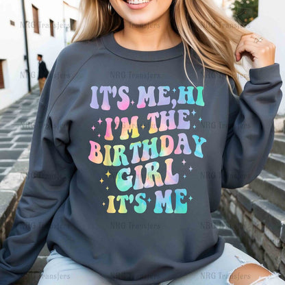 a woman wearing a sweatshirt that says it's me i'm the birthday