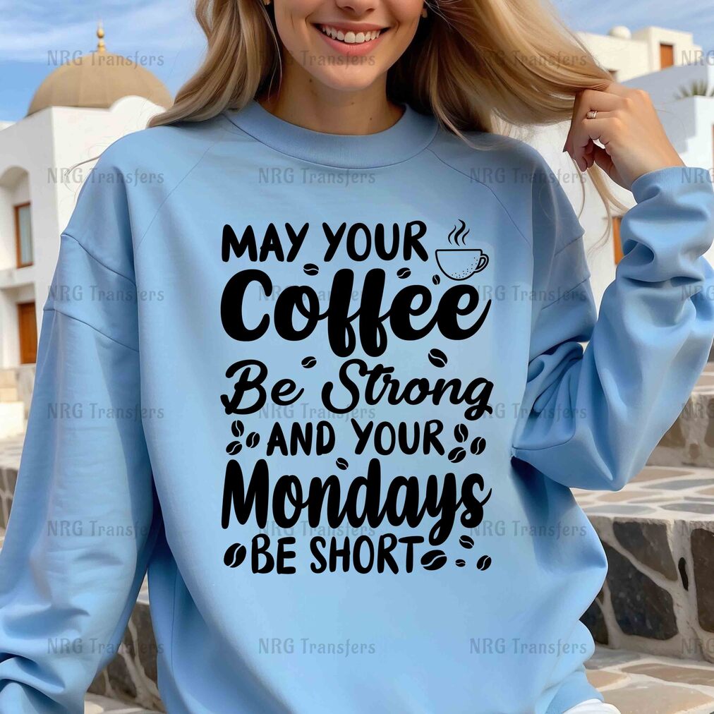 a woman wearing a sweatshirt that says may your coffee be strong and your mondays