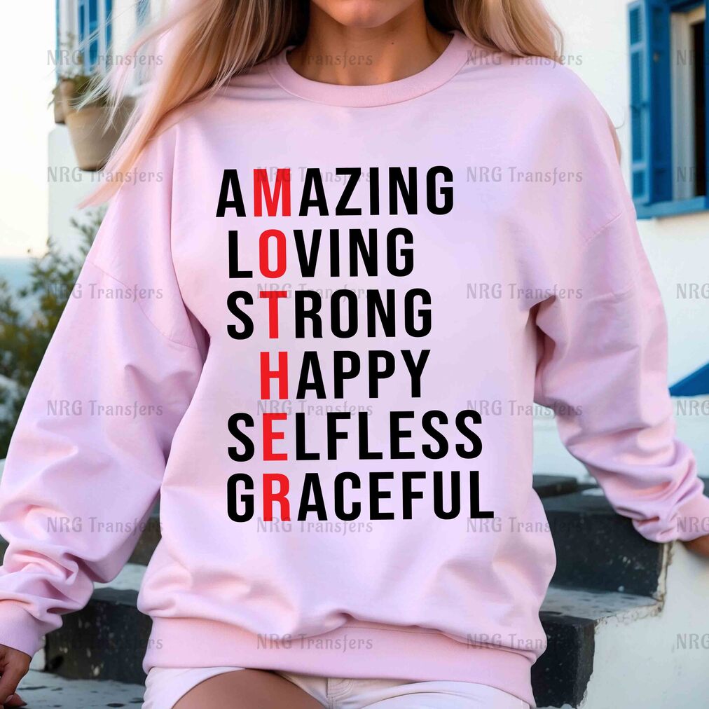 a woman wearing a pink sweatshirt that says amazing loving strong happy selfies graceful