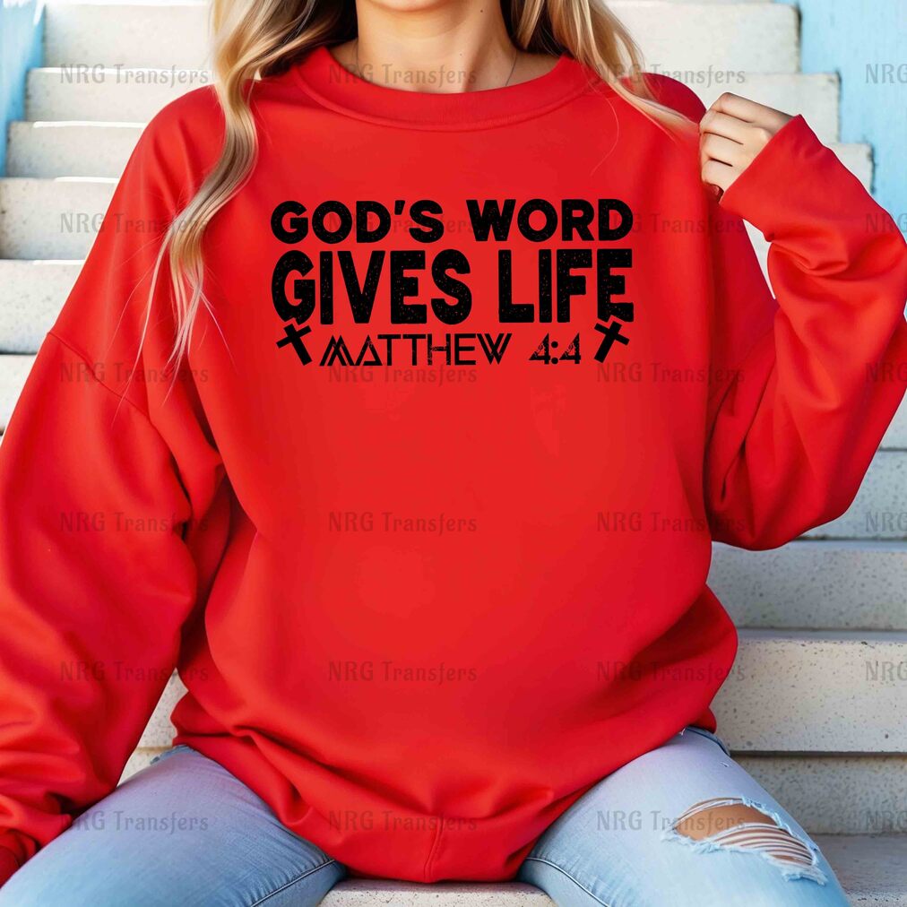 a woman wearing a red sweatshirt that says god's word gives life