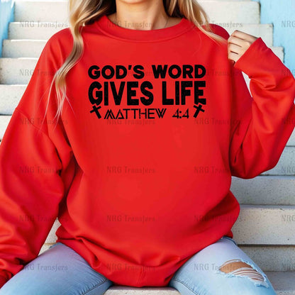 a woman wearing a red sweatshirt that says god's word gives life