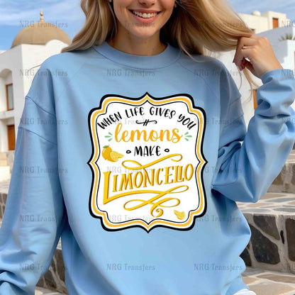 a woman wearing a blue sweatshirt with lemons on it