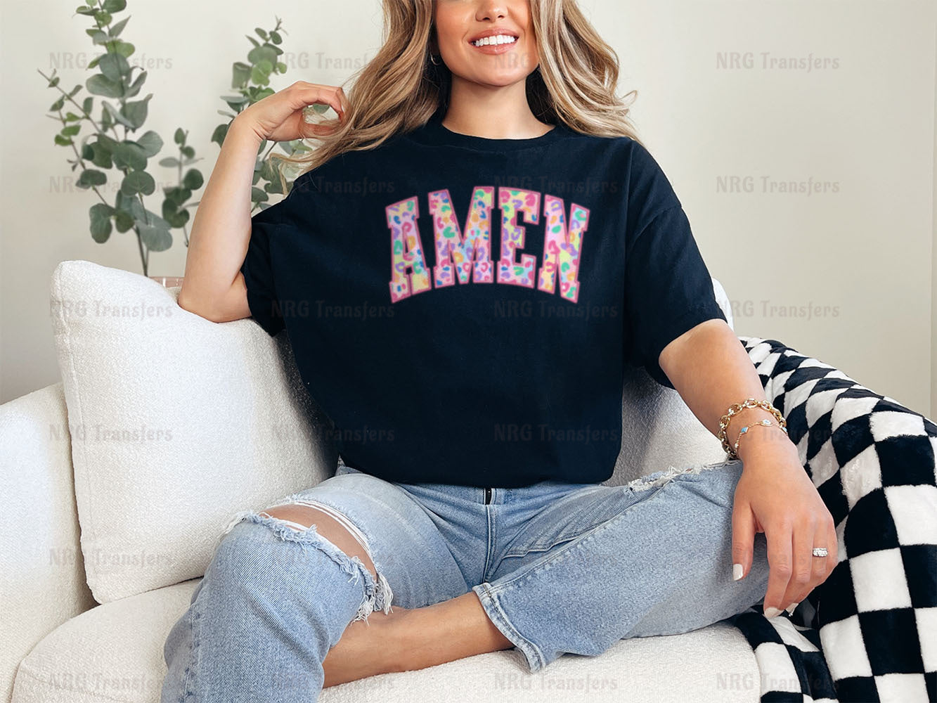 a woman sitting on top of a white couch