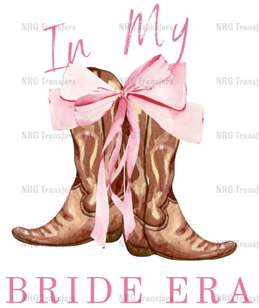 a pair of cowboy boots with a pink bow