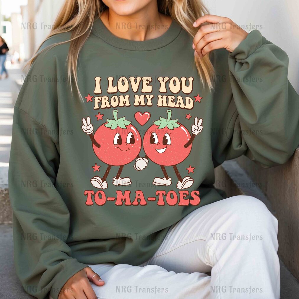 a woman wearing a sweatshirt that says i love you from my head to - ma