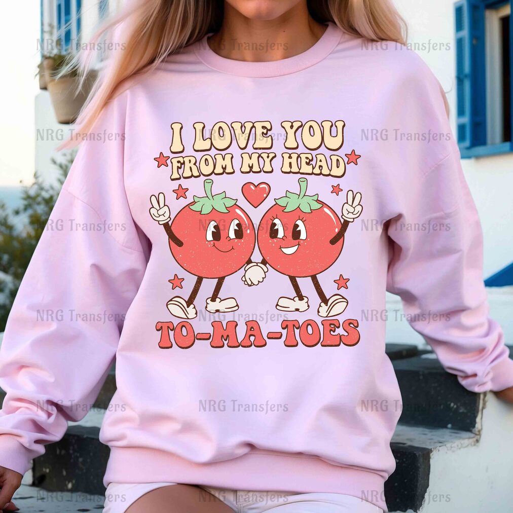 a woman wearing a pink sweatshirt that says i love you from my head to ma