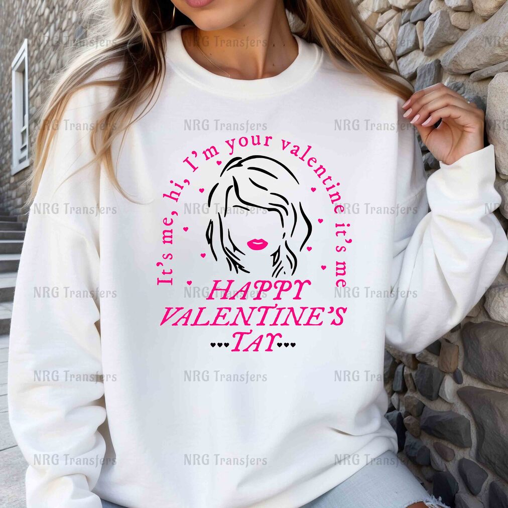 a woman wearing a white sweatshirt with the words happy valentine's day on it