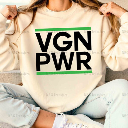 a woman sitting on a couch wearing a sweatshirt with the word vgn pwr