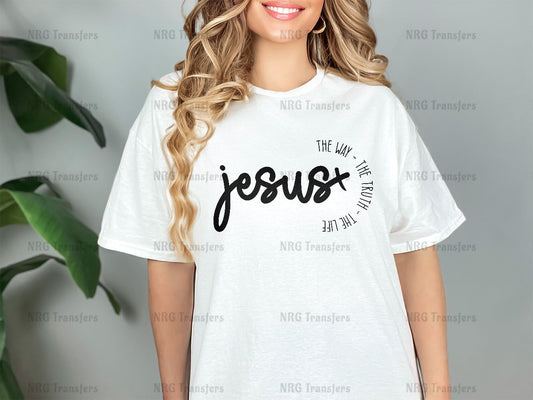 a woman wearing a white t - shirt with the word jesus printed on it