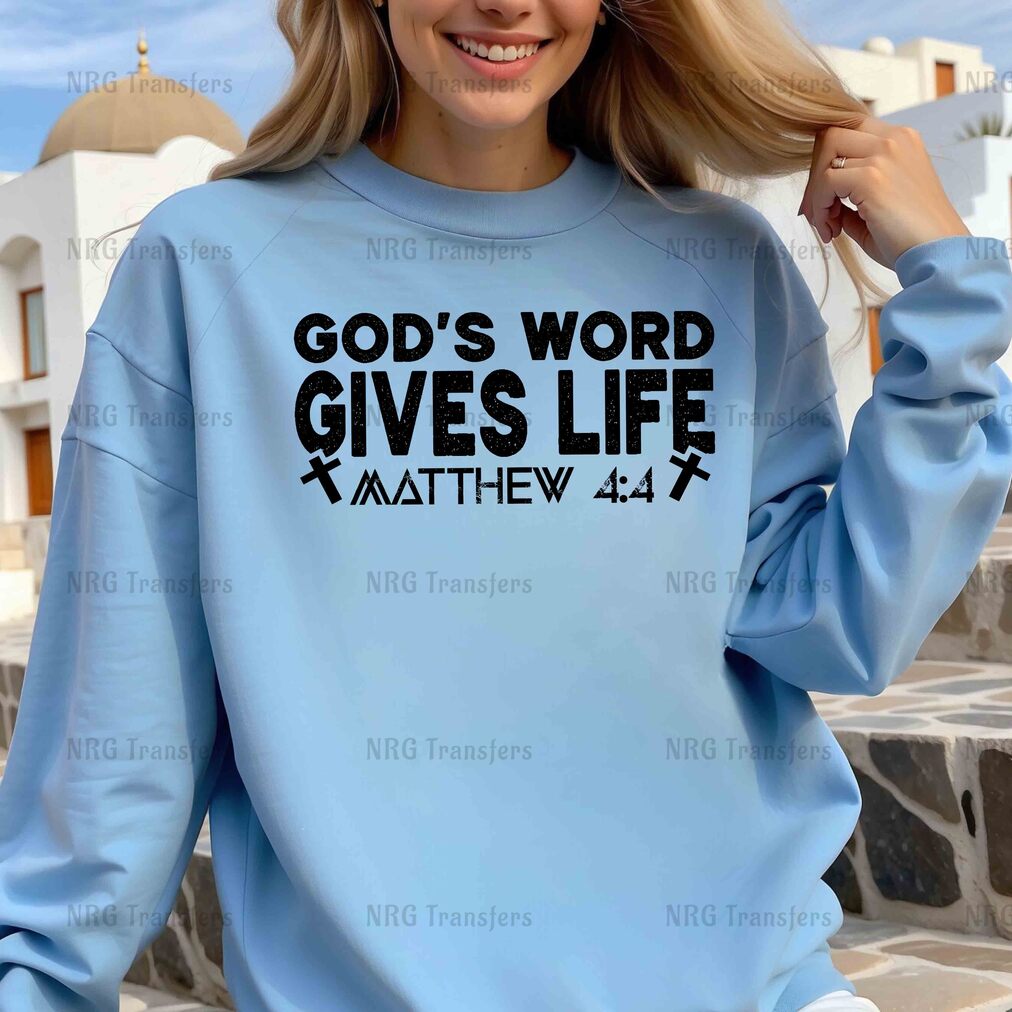 a woman wearing a blue sweatshirt that says god's word gives life